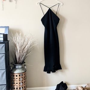 Just below the knee, little black dress.